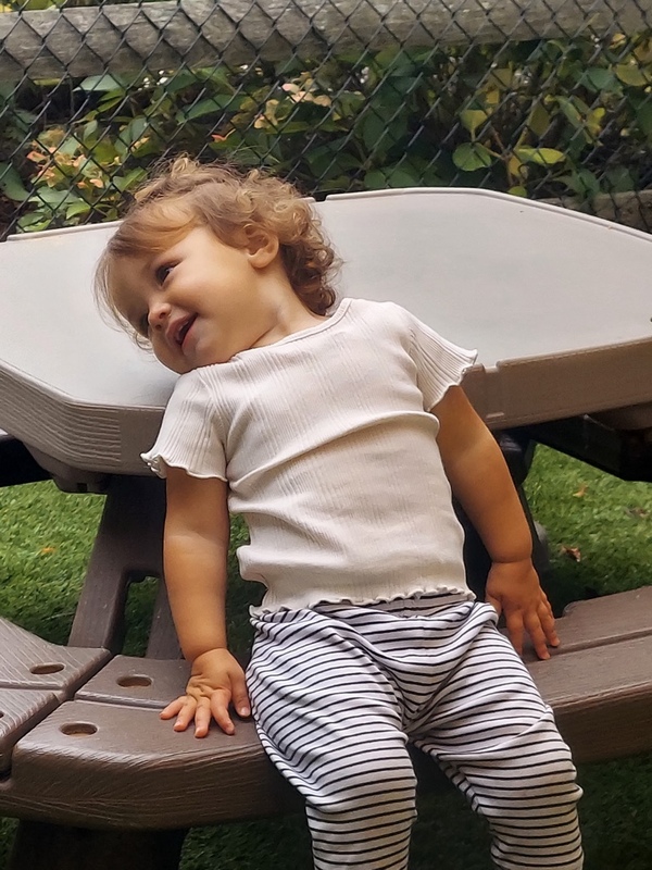 Kids' playroom with large colorful alphabetic and numeric area rug